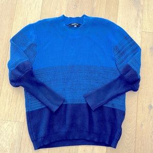 Crew neck Colorblock sweater. Never worn. Size Large.
